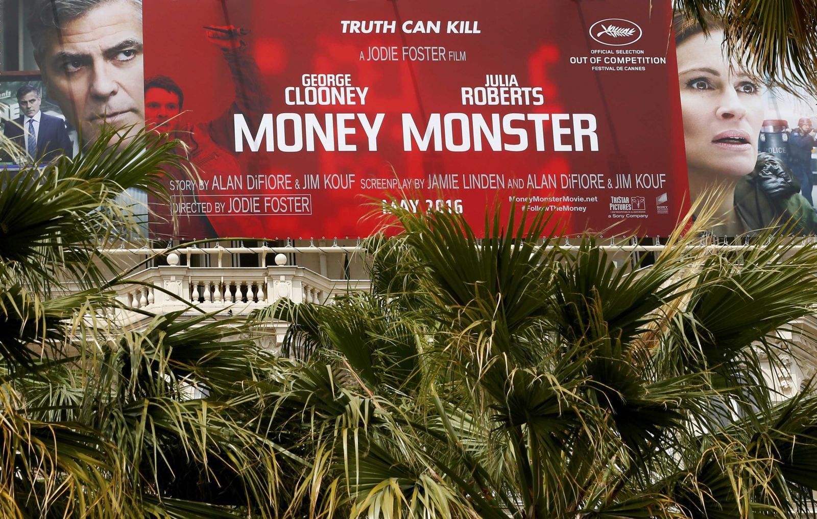 A poster for the film Money Monster is displayed outside the Carlton hotel before the start of the 69th Cannes Film Festival in Cannes France May 9 2016 REUTERS Yves Herman