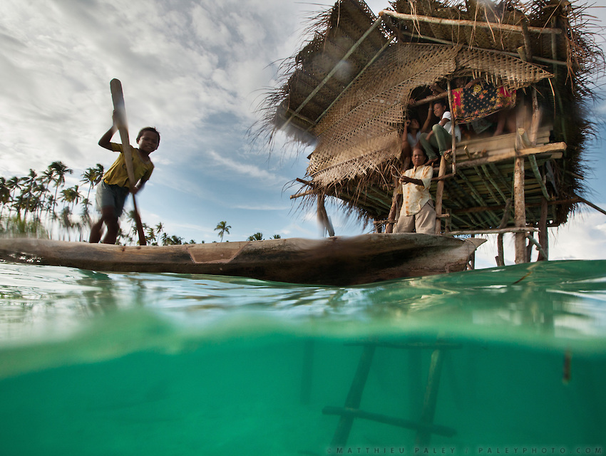 Arriving for lunch at a stilt house. You can come swimming or by dug-out canoe. Bajau people (also known as "Sea Gypsies”) live a seaborne lifestyle, getting most of their food from the ocean. Lots of them are stateless and not recognised by neighboring countries because of their nomadic lifestyle.