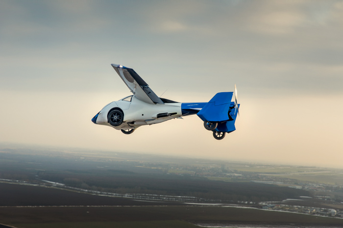 Flying car during the testing flight. It is driven by Štefan Klein, AEROMOBIL Co-FOUNDER, CTO, CHIEF DESIGNER. AeroMobil transforms in seconds from an automobile to an airplane. Aeroport Nitra, Slovakia, 2015